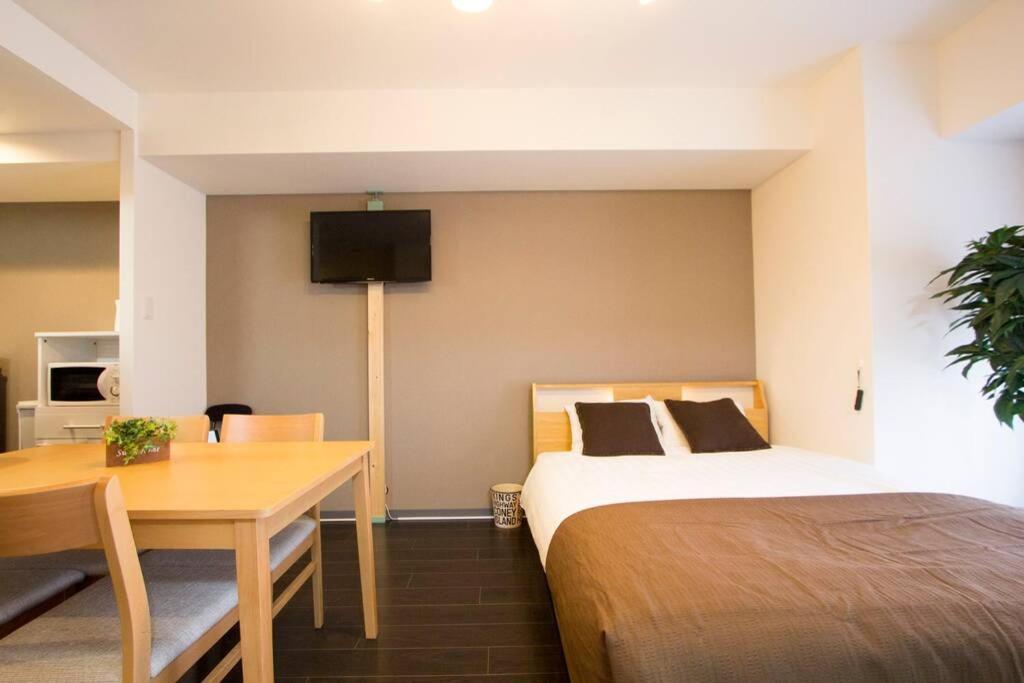 Apartamento ようこそ札幌へ! 大通公園まで地下鉄10分 定員6名 Firetv完備 1階はセコマ Exterior foto