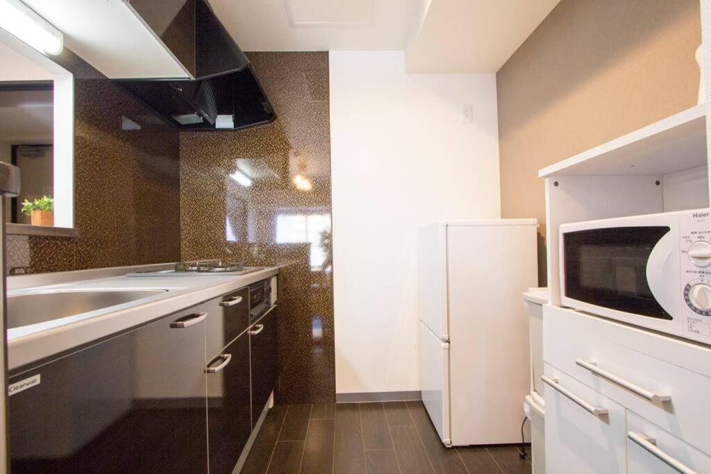 Apartamento ようこそ札幌へ! 大通公園まで地下鉄10分 定員6名 Firetv完備 1階はセコマ Exterior foto